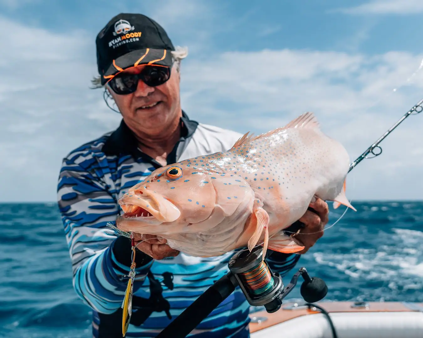 Ryan Moody and coral trout fishing offshore.